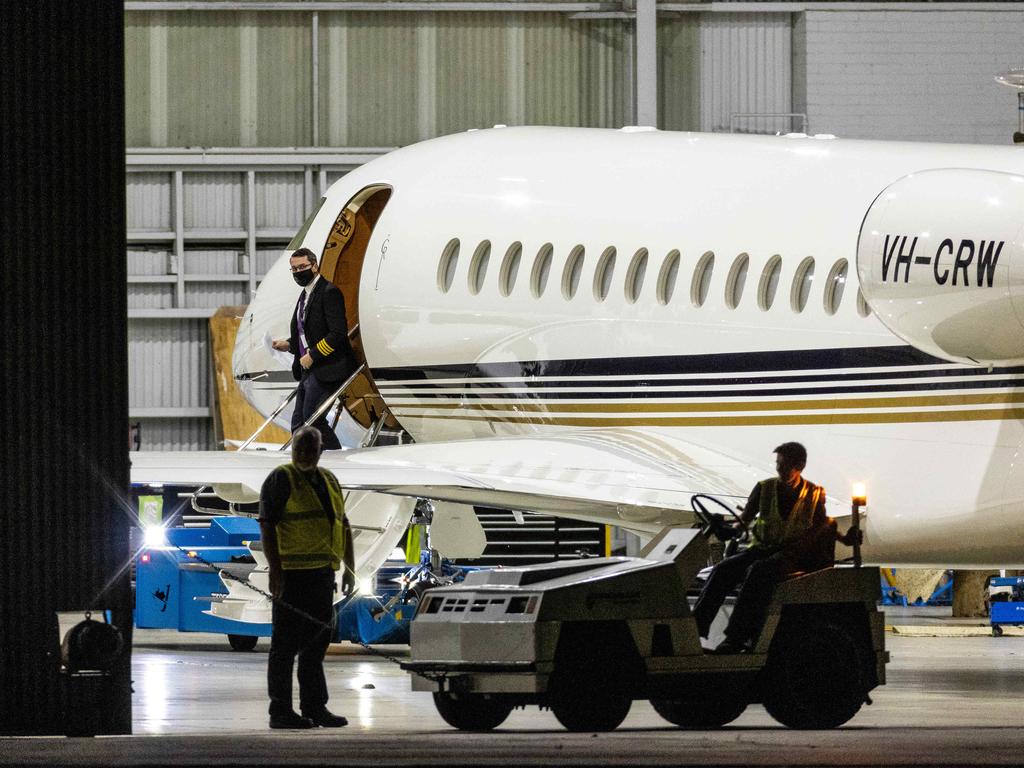 Doors to the hangar were closed before the casket was removed. Picture: Jake Nowakowski