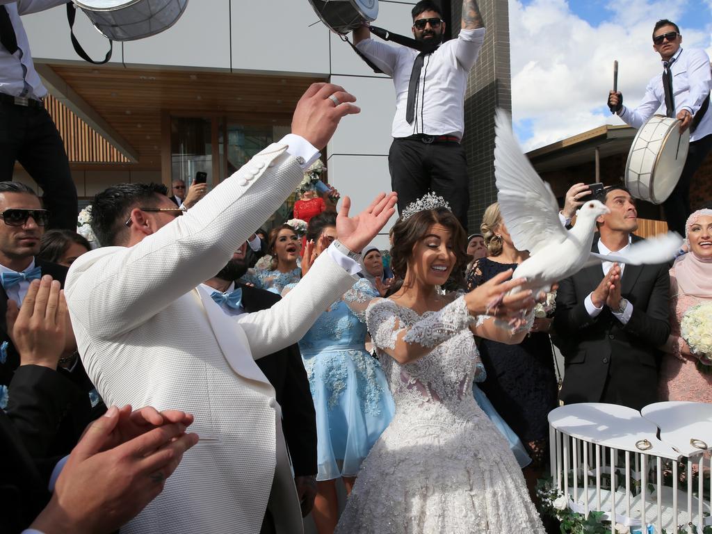 The couple let doves go after the ceremony. Picture: Toby Zerna