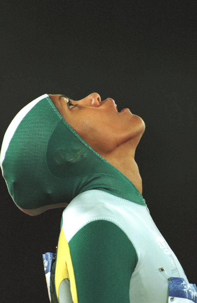 2000: Cathy Freeman takes a deep breath and looks skywards before the 400m final at the Sydney Olympics. 49.13 seconds after the starter’s gun, Freeman was a gold medal winner. Picture: David Caird