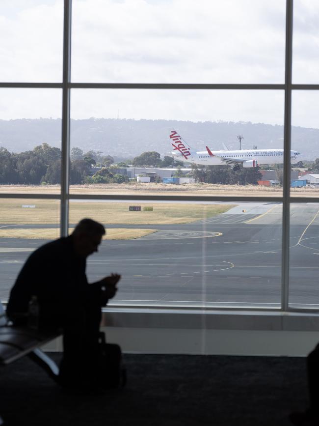 A Virgin Australia plane lands at Adelaide Airport. Picture: NCA NewsWire / Morgan Sette