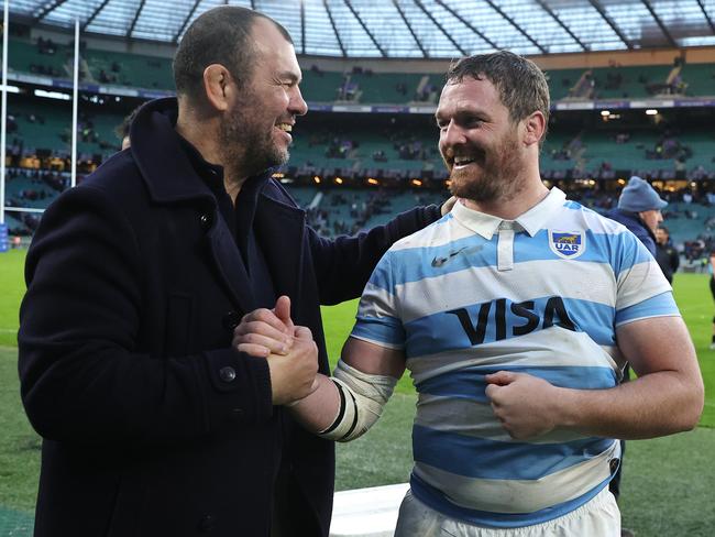 Michael Cheika and Argentina captain Julian Montoya celebrate after beating England at Twickenham last year. Picture: David Rogers/Getty Images