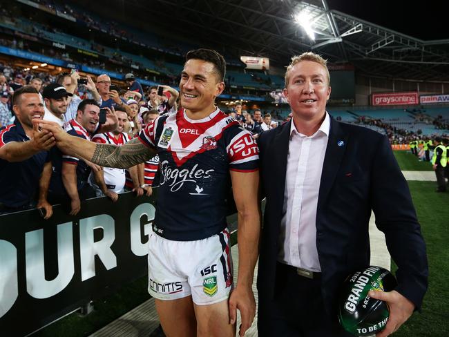 Sonny Bill Williams with coach Trent Robinson after victory in the 2013 NRL Grand Final at ANZ Stadium, Sydney. Picture: Brett Costello