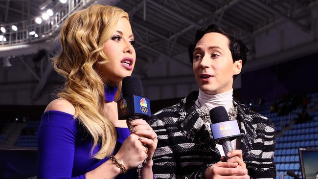 Figure skating announcers Tara Lipinski and Johnny Weir prepare. Photo by Jamie Squire/Getty Images)