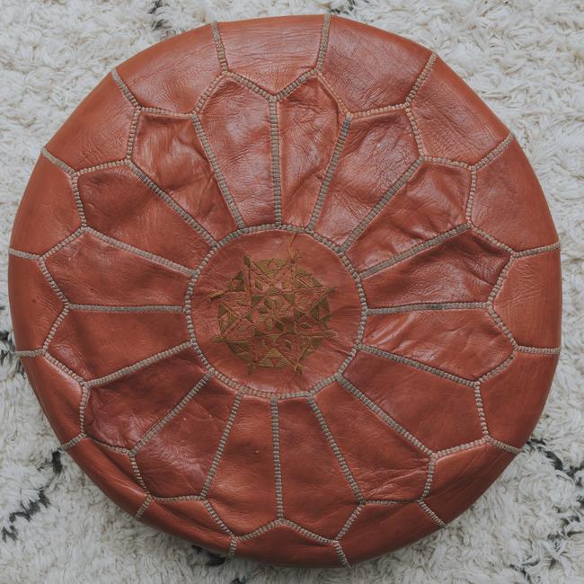 <b>Ottoman: </b>This pouf was picked up on my honeymoon. It was the very first piece of furniture that Charlie and I bought as a married couple.