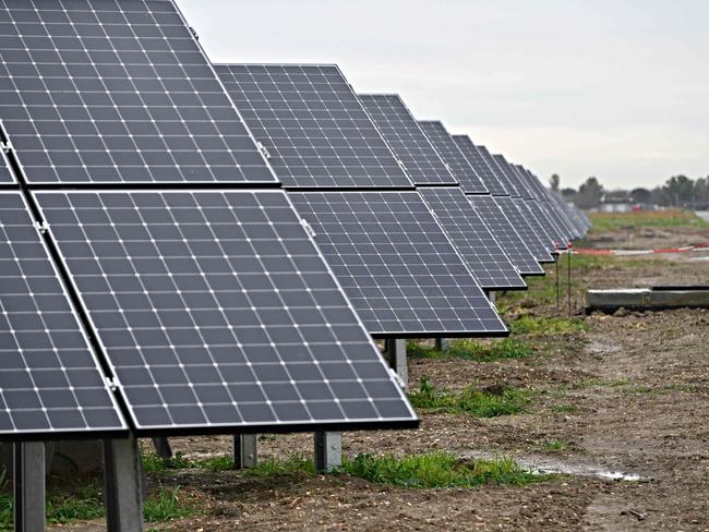 A picture shows photovoltaic panels at the new Solar Farm, located along the runway of Rome Fiumicino airport, during the inauguration by Aeroporti di Roma (ADR), in Fiumicino on January 20, 2025. (Photo by Andreas SOLARO / AFP)