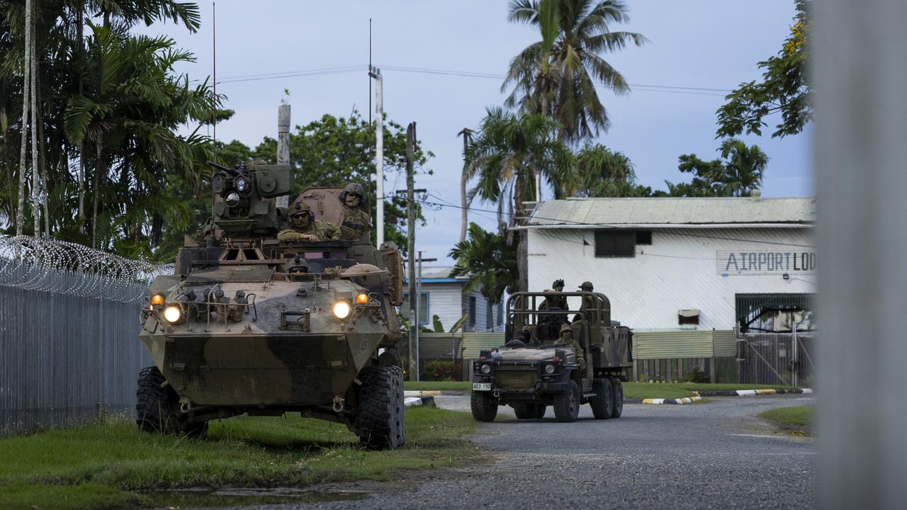 Australian Army soldiers prepare to secure and mark the Wewak Airport runway with infra-red beacons during a training activity in Wewak, Papua New Guinea. PHOTO: CPL Brandon Grey