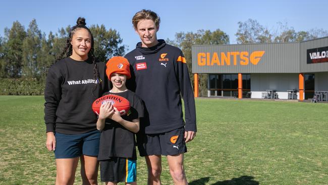 What Ability participant Henry O'Brien, support worker Nicole Nathan and GWS Giant player Lachie Whitfield. Photographer: Kundan Pradhan