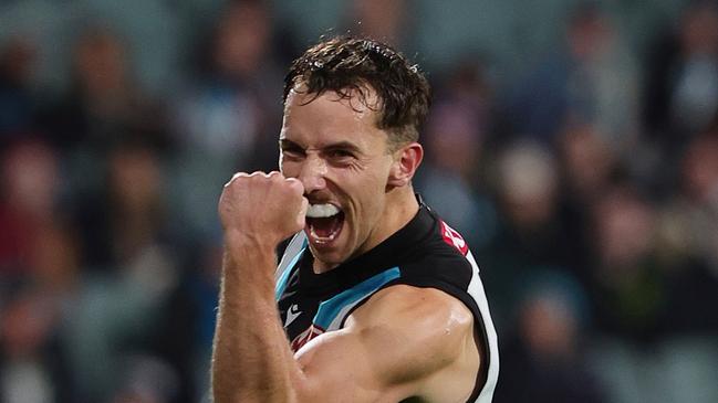 ADELAIDE, AUSTRALIA - JULY 20: Francis Evans of the Power celebrates a goal during the 2024 AFL Round 19 match between the Port Adelaide Power and the Richmond Tigers at Adelaide Oval on July 20, 2024 in Adelaide, Australia. (Photo by Sarah Reed/AFL Photos via Getty Images)