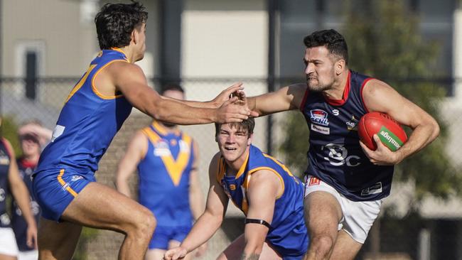 SFNL: Springvale Districts’ Mladen Josic tries the don’t argue. Picture: Valeriu Campan