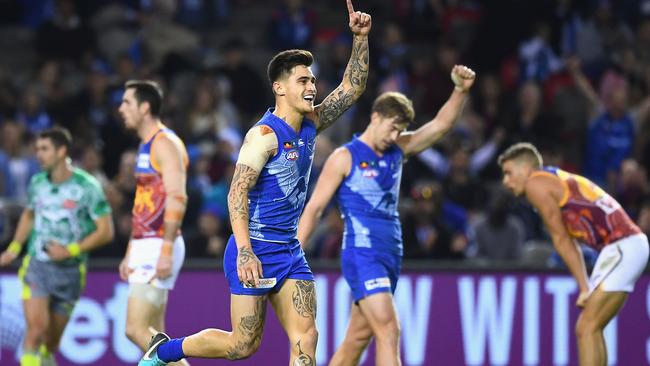 Marley Williams of the Kangaroos celebrates kicking a goal against the Brisbane Lions. (Photo by Quinn Rooney/Getty Images)