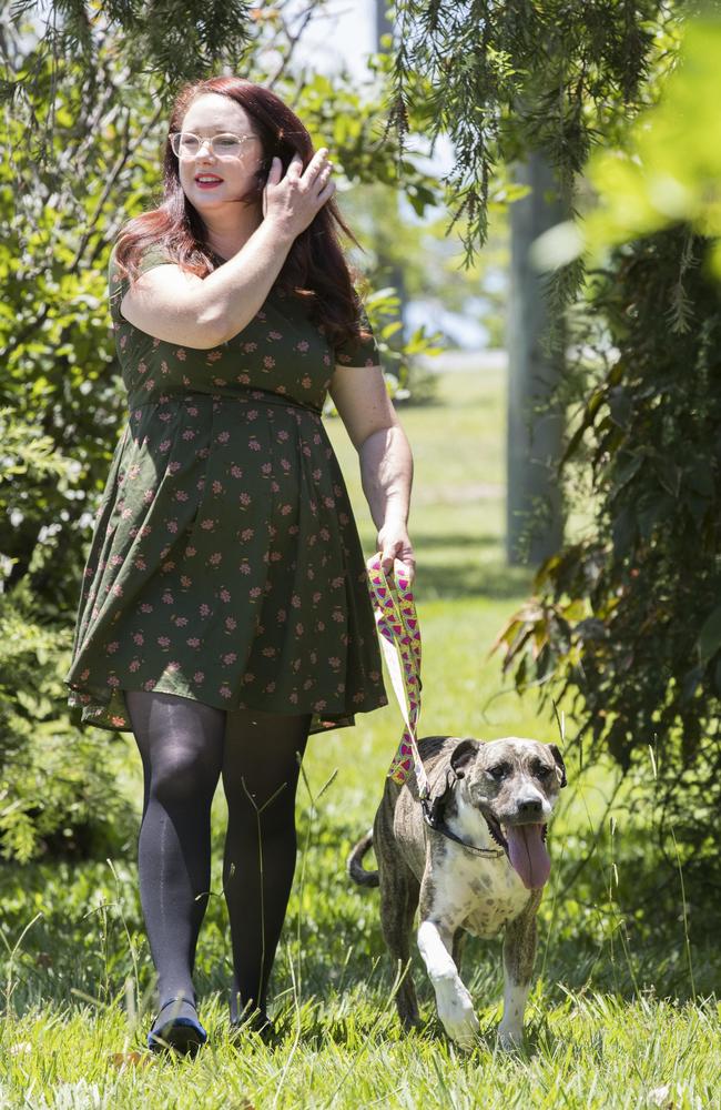 Mel Buttle walks her dog Ruby. Picture: Lachie Millard