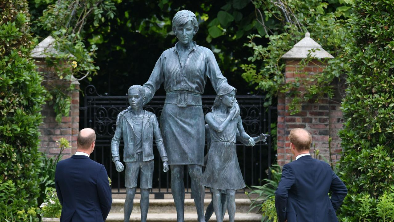 Prince William and Prince Harry looking at the statue of their mother, Diana. Picture: Dominic Lipinski – WPA Pool/Getty Images