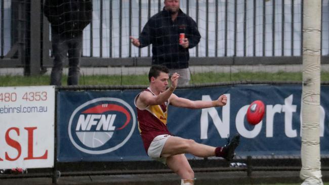 The moment Ben Paterson’s snap delivered Lower Plenty its first premiership since 2011. Picture: Mark Dadswell.