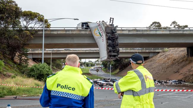 Police at the scene of the truck crash. Picture: Jake Nowakowski