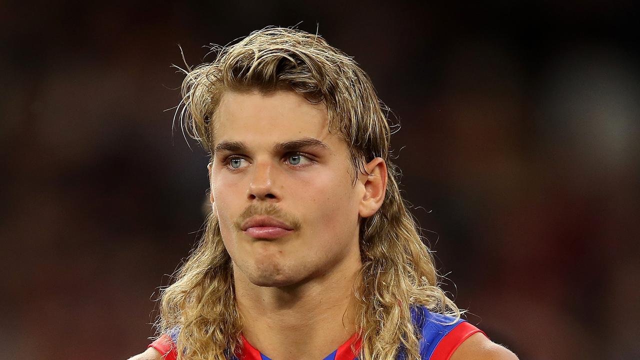 PERTH, AUSTRALIA - SEPTEMBER 25: Bailey Smith of the Bulldogs looks dejected while watching the trophy presentation after the 2021 Toyota AFL Grand Final match between the Melbourne Demons and the Western Bulldogs at Optus Stadium on September 25, 2021 in Perth, Australia. (Photo by Gary Day/AFL Photos via Getty Images)