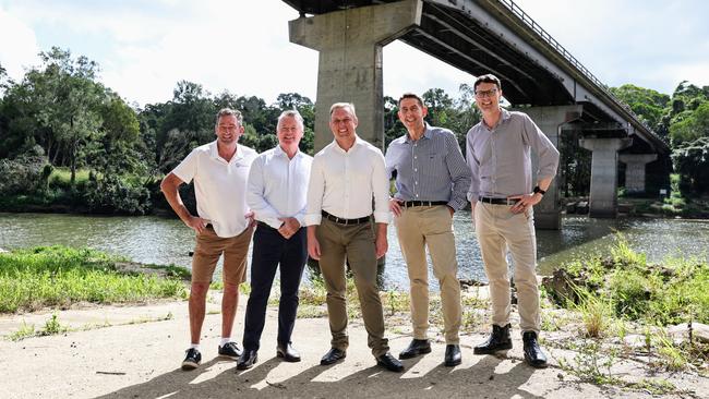 Barron River MP Craig Crawford, Cairns MP Michael Healy, Queensland Premier Steven Miles, Queensland Treasurer Cameron Dick and Transport Minister Bart Mellish make the announcement of a $450m election pledge to build a new bridge on the banks of the Barron River at Kuranda. Picture: Brendan Radke