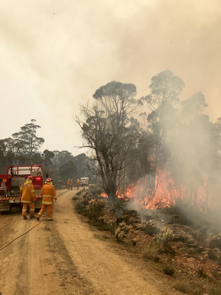 Firefighters at work battling blazes in Tasmania's Central Highlands. Picture: Tara Felts