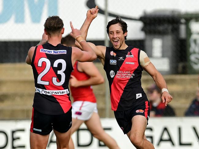 09/06/18 - SANFL: West Adelaide v Norwood at Richmond Oval.  West's Kaine Stevens celebrates kicking a goal with team mate Errin Wasley-Black.Picture: Tom Huntley