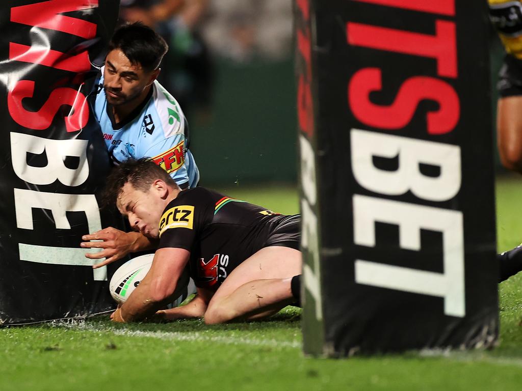 Shaun Johnson of the Sharks and Dylan Edwards of the Panthers compete for the ball. Picture: Mark Kolbe/Getty Images