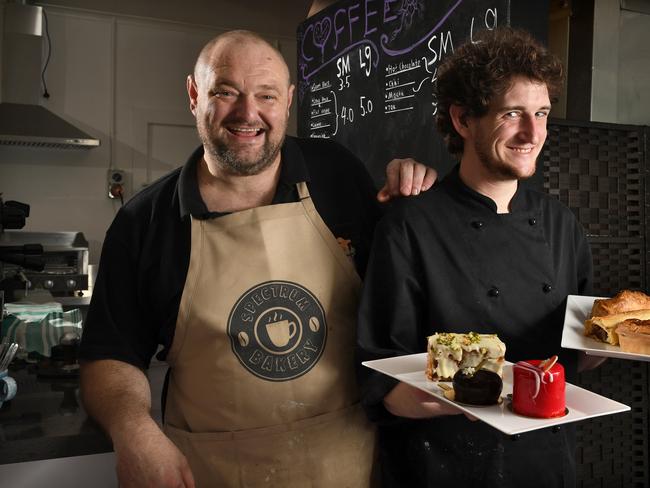 SPECTRUM BAKERY. Spectrum Bakery, Athelstone, owner Daniel Forrester with apprentice baker Nathan Lawson 26 who has dyslexia. Pictured at the bakery on the 15th Feb, 2022. Picture: Tricia Watkinson