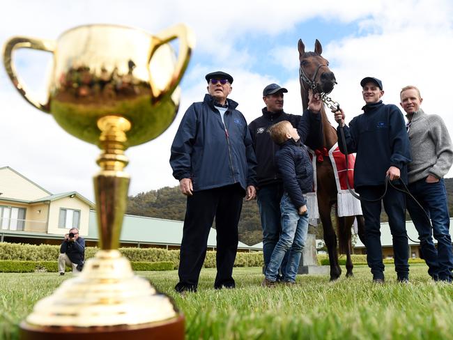 Last year’s Melbourne Cup winner Almandin with (L-R) owner Lloyd Williams, trainer Rob Hickmott, Lloyd's grandson Frank Williams, Joel Flannery and jockey Kerrin McEvoy. Pic: AAP Image/Tracey Nearmy