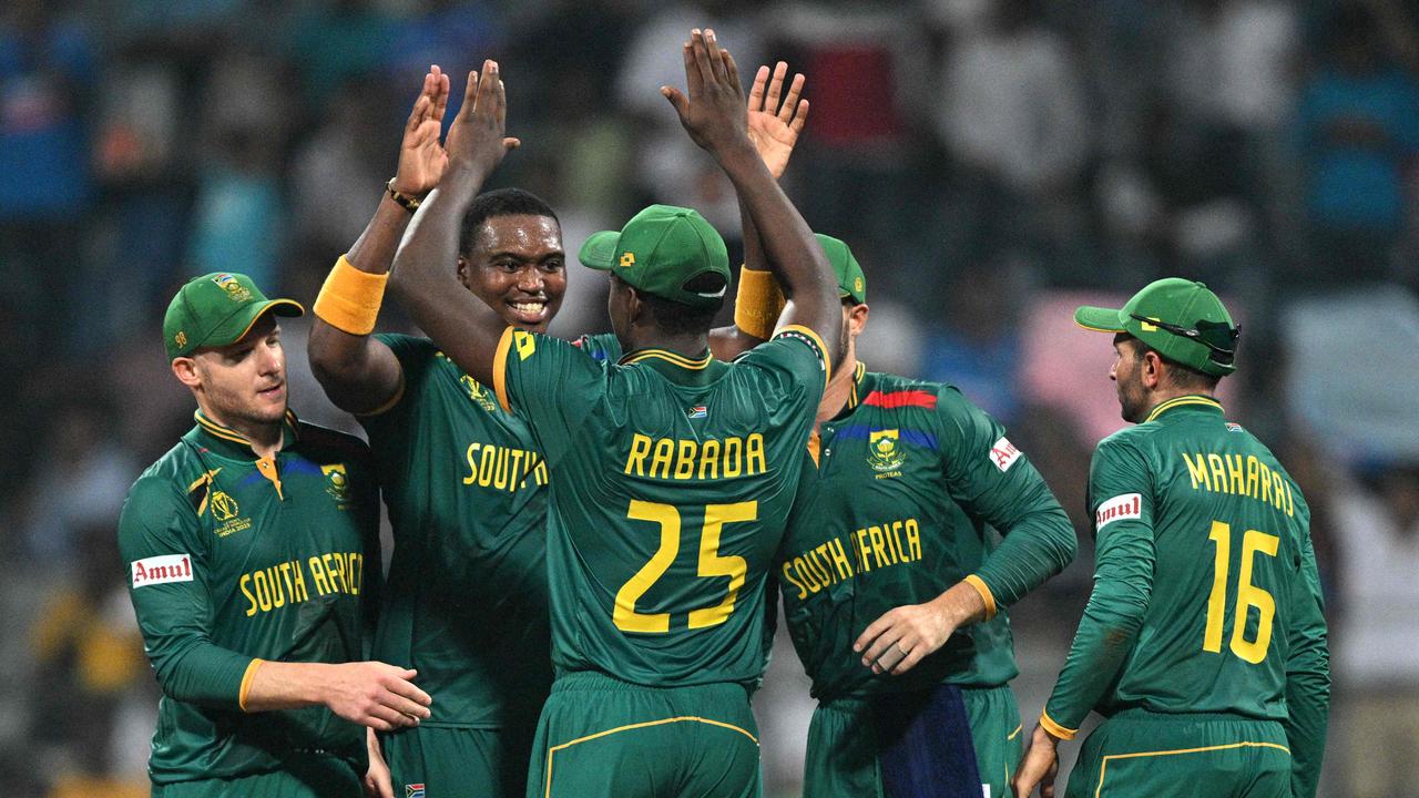 South Africa's Lungi Ngidi (2L) celebrates with teammates after taking the wicket of England's David Willey. Picture: AFP