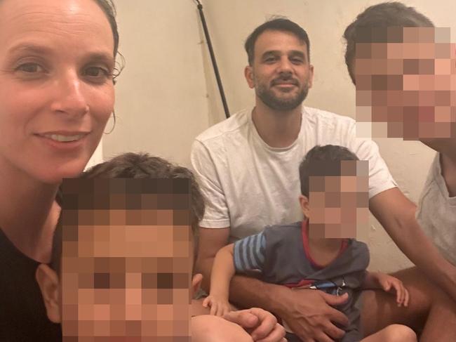 NETWORK ONLY (NOTE CHILDRENS FACES BLURRED) Emily Gian, 41, is an Australian living in Yehud, near Israel's Ben Gurion International Airport with her husband Tomer and their three children, aged 11, 9 and 5. This is an image of the family in their bunker. Supplied