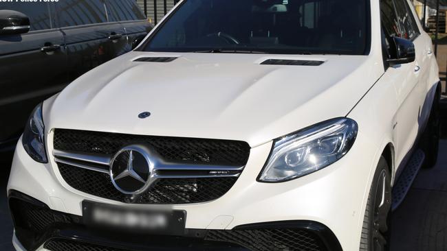 Two luxury cars, including a Mercedes AMG were seized as part of police raids across Doonside, Blacktown, Smithfield and Sylvania this morning. Picture: NSW Police