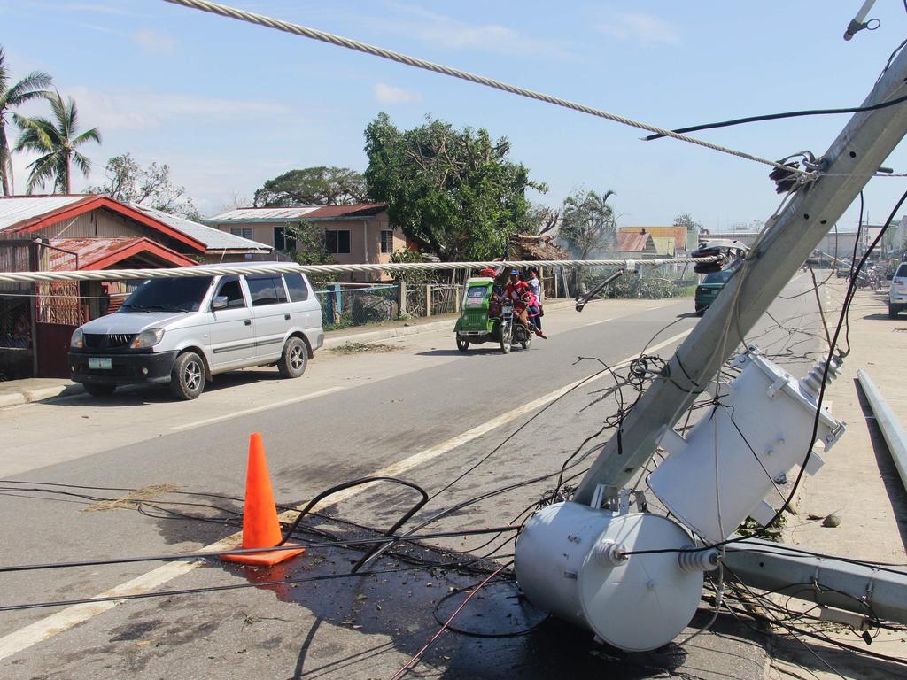 Typhoon Phanfone swept across remote villages and popular tourist areas of the central Philippines on Christmas Day claimed at least 20 lives. Picture: AFP