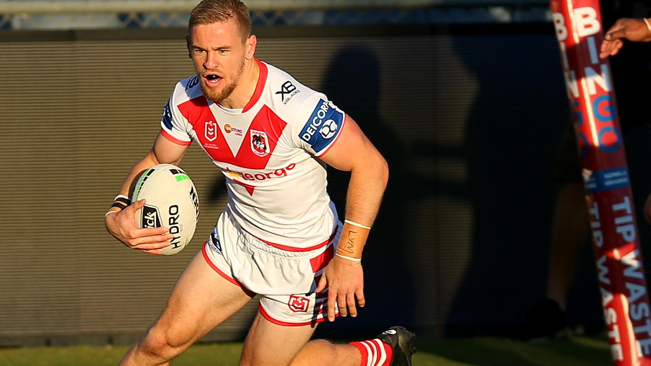 Matt Dufty scores for the Dragons in last week’s win over the Sharks (Photo by Jason McCawley/Getty Images).