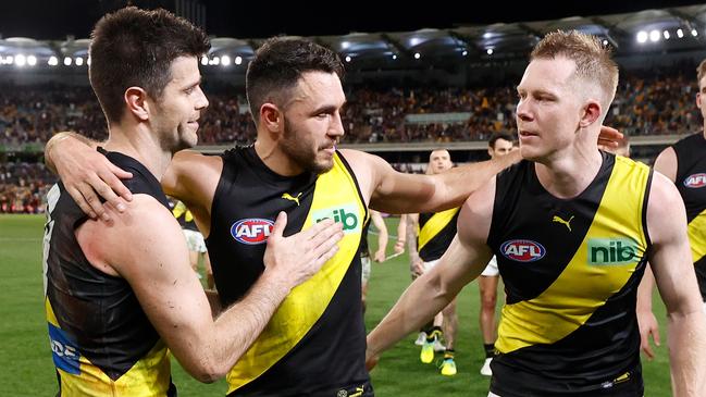 BRISBANE, AUSTRALIA - SEPTEMBER 01: Shane Edwards of the Tigers is chaired from the field after his final match by teammates Trent Cotchin (left) and Jack Riewoldt (right) during the 2022 AFL Second Elimination Final match between the Brisbane Lions and the Richmond Tigers at The Gabba on September 1, 2022 in Brisbane, Australia. (Photo by Michael Willson/AFL Photos via Getty Images)
