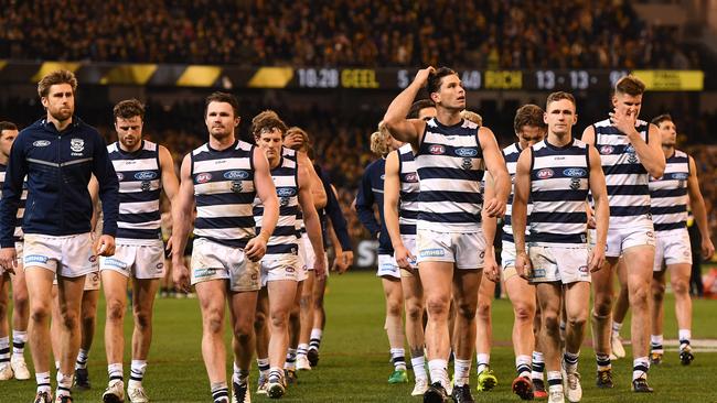 The dejected Cats leave the MCG after falling 51 points short of Richmond. Picture: AAP