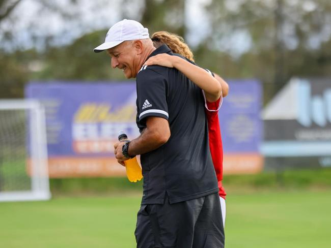 Rosie Malone arm in arm with Gold Coast Knights head of women's football Gary French. Picture: Facebook.