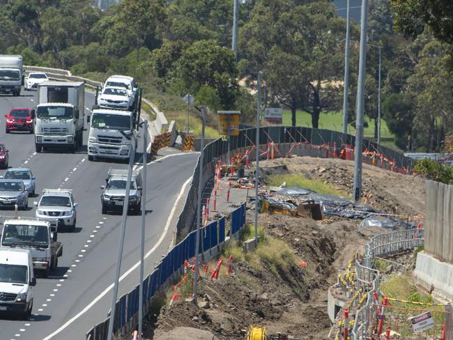 A mound of soil- covered in black tarp behind the barricades running along the Westgate Freeway, Williamstown Road on- ramp heading outbound.Picture Jay Town