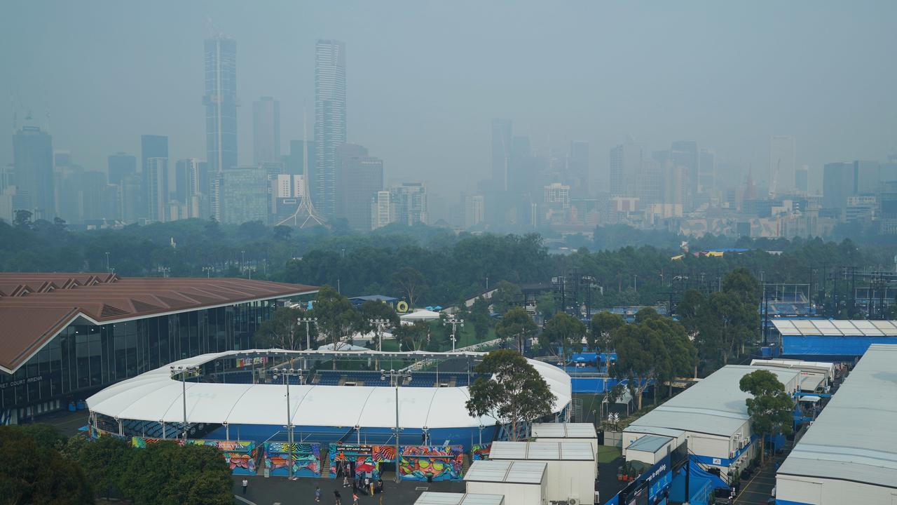 Melbourne CBD shrouded by smoke haze, as seen from Melbourne Park on Wednesday. Picture: AAP Image/Michael Dodge