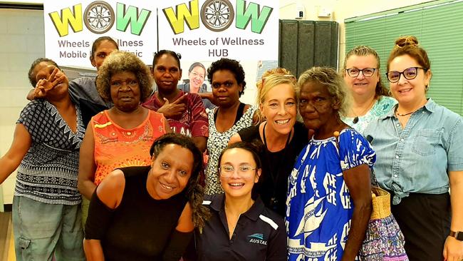 Staff, volunteers and clients at the Wheels of Wellness hub. Picture: Supplied