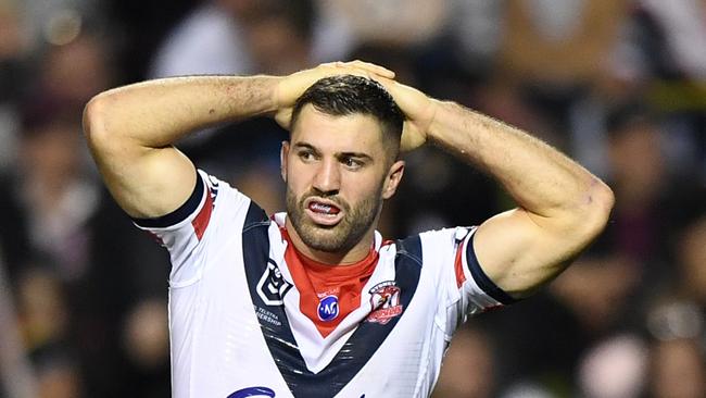 James Tedesco of the Roosters reacts during the Round 13 NRL match between the Penrith Panthers and the Sydney Roosters at Panthers Stadium in Sydney, Sunday, June 9, 2019. (AAP Image/Joel Carrett) NO ARCHIVING, EDITORIAL USE ONLY