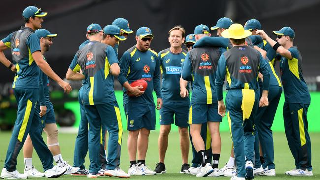 Australian ODI captain Aaron Finch (centre, with football) speaks to players and officials at the SCG yesterday. Picture: AAP