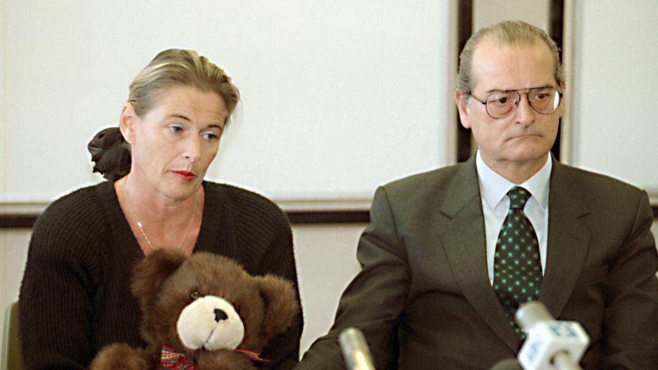 Giuseppe Cafasso (deceased), the father of murder victim Victoria Cafasso, comforts her mother, Xenia Cafasso, at the press conference in Launceston in 1995. Picture: Leigh Winburn