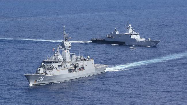 HMAS Parramatta conducts a cooperative activity with Royal Malaysian Navy Ship KD Selangor. Picture: Supplied