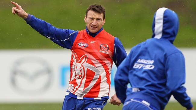 MELBOURNE, AUSTRALIA - JULY 09: Brent Harvey calls for the ball during a North Melbourne Kangaroos AFL training session at Arden Street Ground on July 9, 2014 in Melbourne, Australia. (Photo by Robert Prezioso/Getty Images)