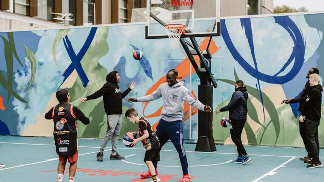 Shooting hoops on the new court.