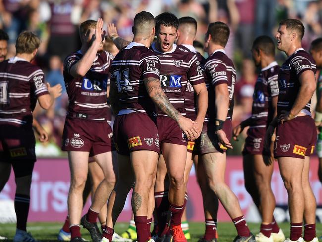 Manly Sea Eagle players celebrate after the siren during the Round 7 NRL match between the Manly Sea Eagles and the Canberra Raiders at Lottoland in Sydney, Sunday, April 28, 2019. (AAP Image/Joel Carrett) NO ARCHIVING, EDITORIAL USE ONLY