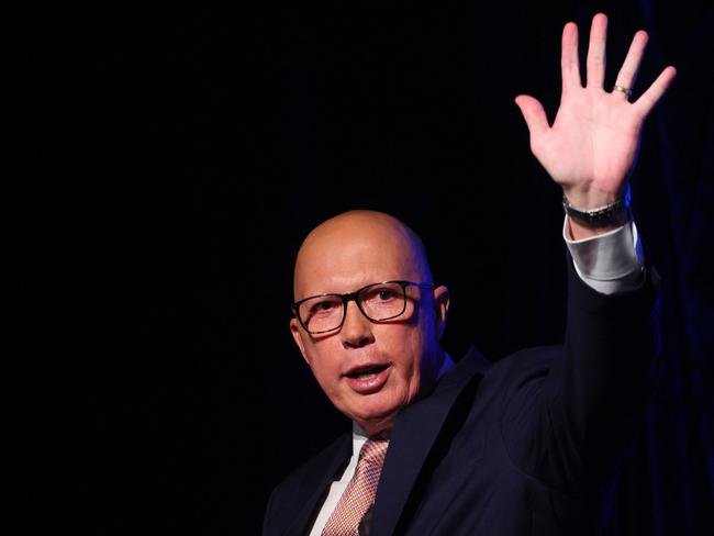 Australia's Opposition Leader Peter Dutton waves after conceding defeat in the general election to Prime Minister Anthony Albanese. (Photo by Patrick Hamilton / AFP)