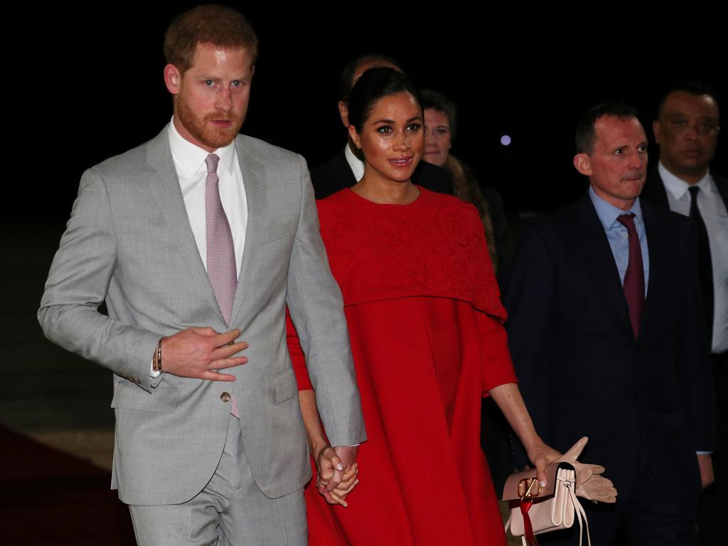 Prince Harry, Duke of Sussex and Meghan, Duchess of Sussex walk hand-in-hand. Picture: Picture: Getty