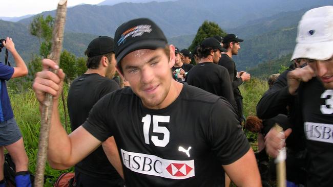 Hodge trekking the Kokoda Track in 2004.