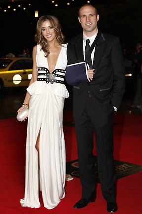 <p>At the 2008 Brownlow Medal Chris Judd places 8th on the points tally. Rebecca, however, was a clear winner in the fashion stakes in her unique J'Aton gown. Picture: Paul Trezise</p>