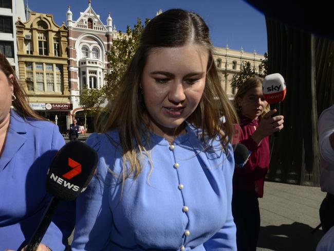 PERTH , AUSTRALIA - NewsWire Photos MARCH 5, 2024  Brittany Higgins arrives at Perth Supreme court with fiance David Sharaz.  Picture: NCA NewsWire / Sharon Smith