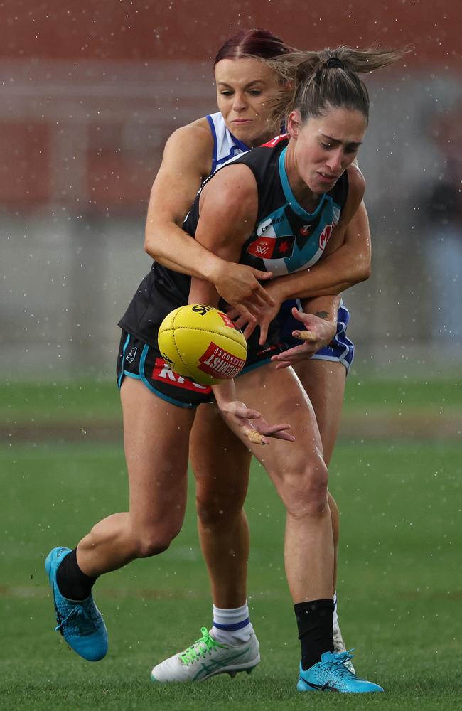 North Melbourne’s Jenna Bruton tackles Cheyenne Hammond of the Power. Picture: Daniel Pockett/AFL Photos