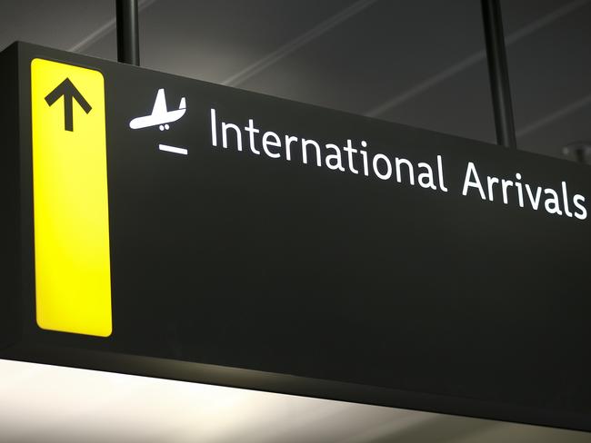 WELLINGTON, NEW ZEALAND - MARCH 16: An international arrivals sign at Wellington Airport on March 16, 2020 in Wellington, New Zealand. Strict new border measures to contain the spread of COVID-19 came into effect at 1am on Monday, requiring all arrivals into New Zealand to self-isolate for 14 days upon arrival. Those in self-isolation must avoid social gatherings, work, school, child care facilities, university, religious gatherings, aged care and health facilities, prisons, sports gatherings, restaurants, and all public gatherings during the two-week period. New Zealand currently has eight confirmed cases of COVID-19. (Photo by Hagen Hopkins/Getty Images)